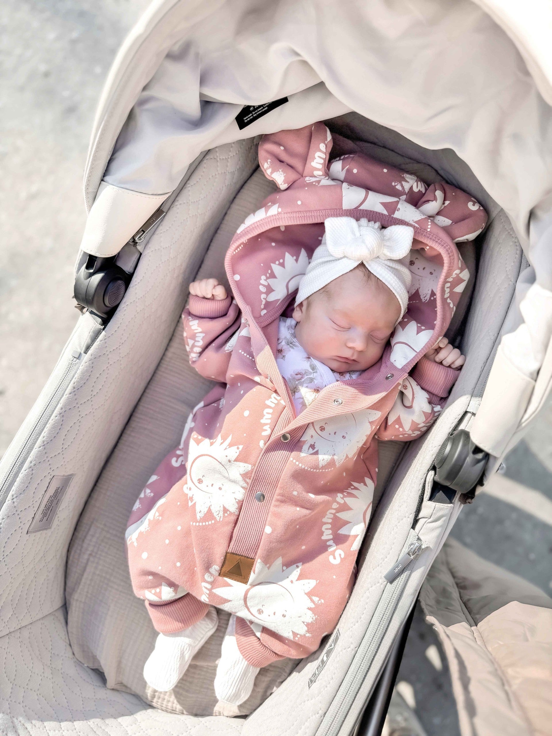 Kombinezonas vaikams ir kūdikiams - Rožinis su saulytėmis - BureiKids